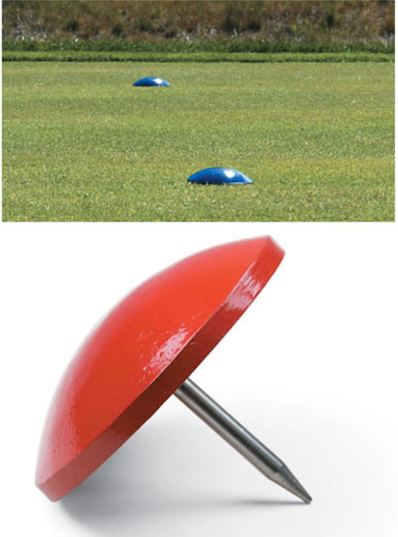 Cast aluminium low profile tee markers on a golf tee, with a red marker close up showing its stainless steel spike