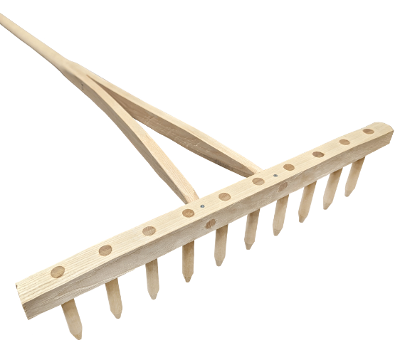 Small wooden hay rake with a pale timber head, wooden tines and a forked handle, on a white background