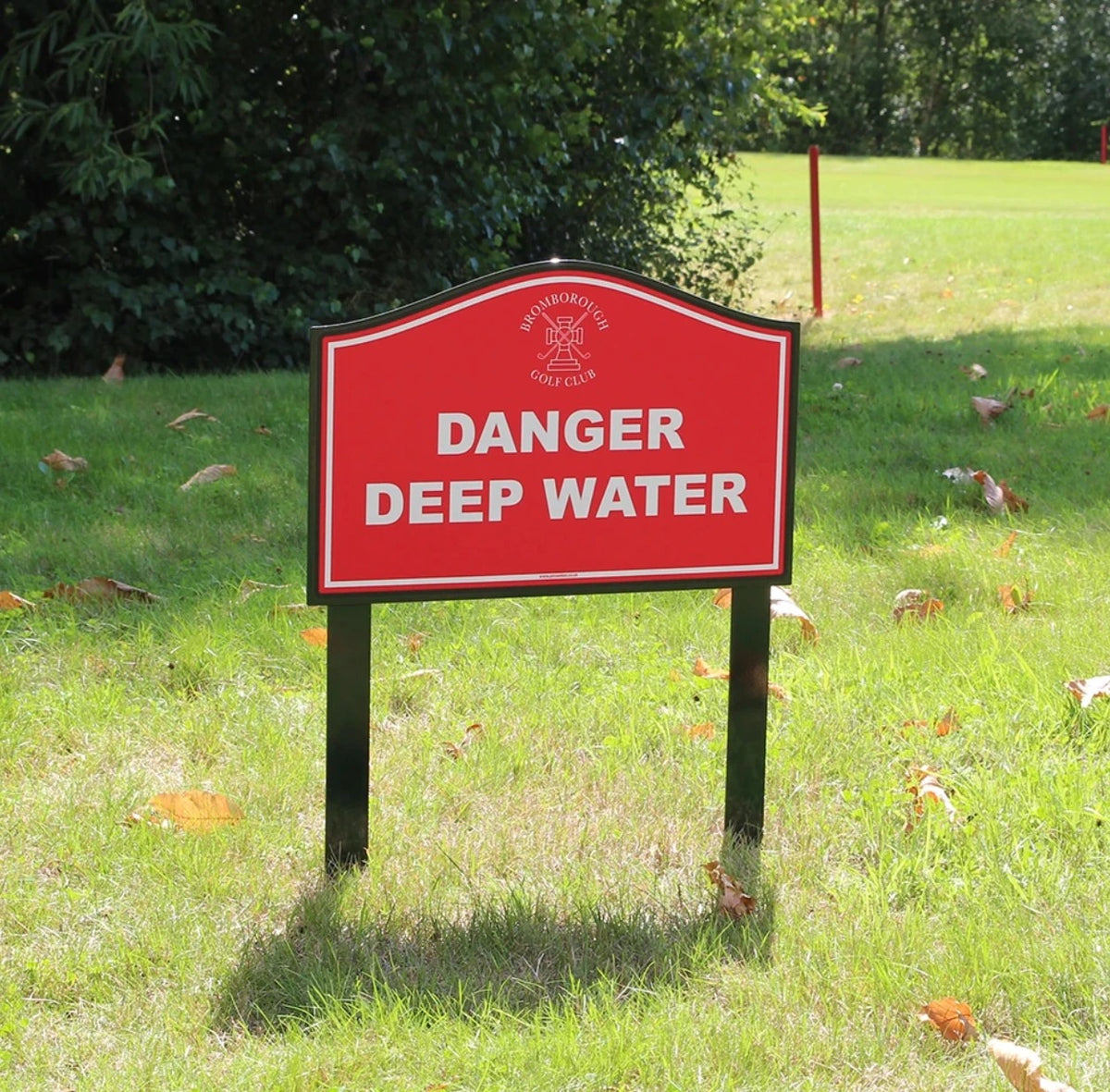 Red aluminium golf course danger sign reading Danger Deep Water with a club crest, on aluminium legs, 450mm x 295mm