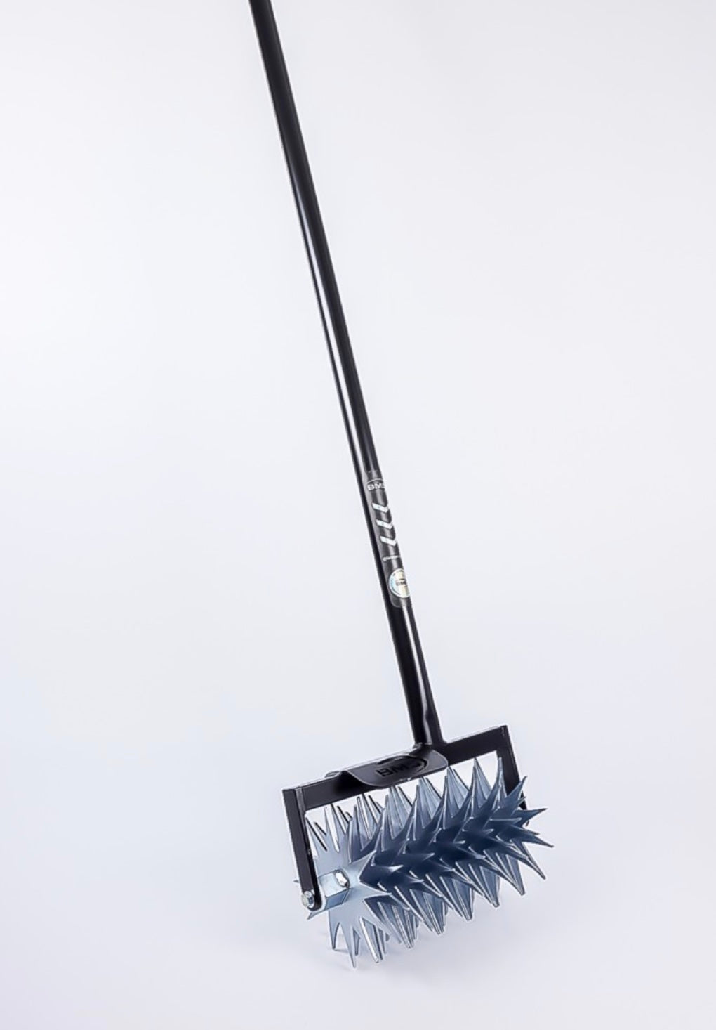 BMS Rotary Hand Lawn Spiker with black 4ft handle and spiked rotary drum