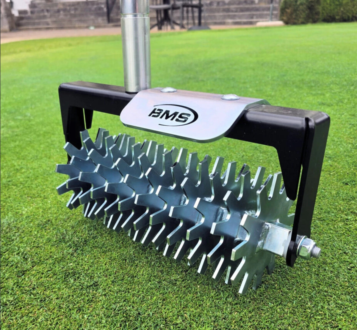 BMS Rotary Hand Seed Slotter overseeding tool with rotary drum and handle