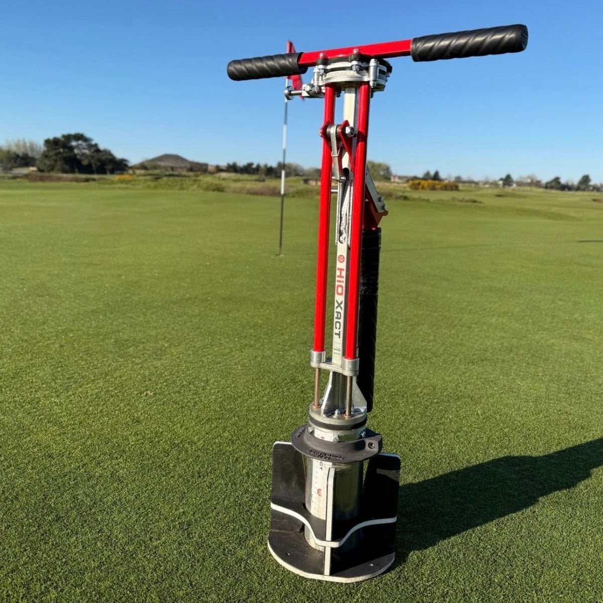 The HiO Xact Hole Cutter on a green