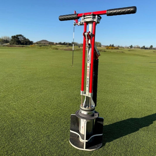 The HiO Xact Hole Cutter on a green