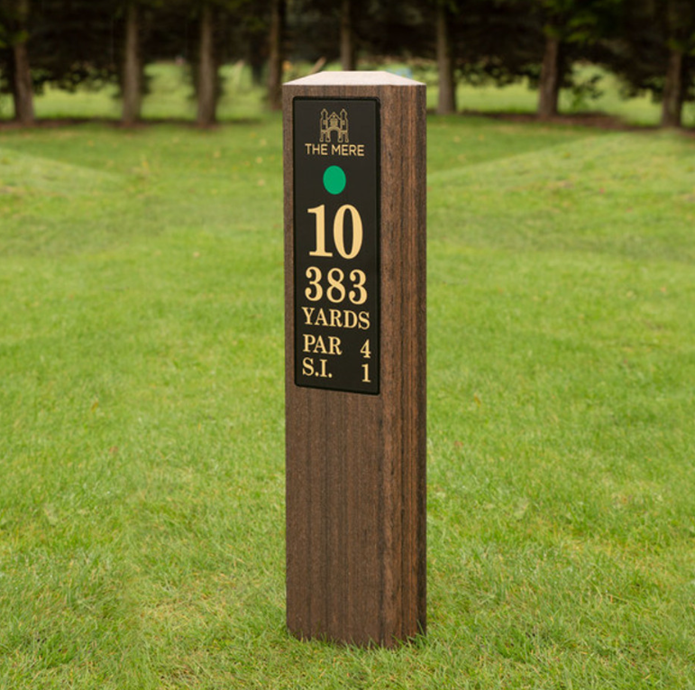 Single post golf tee sign with no sponsor panel in a wood effect finish on the tee