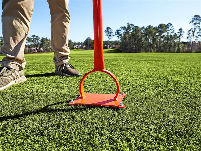 Accuform Slot Seeder plate and blades on a golf green